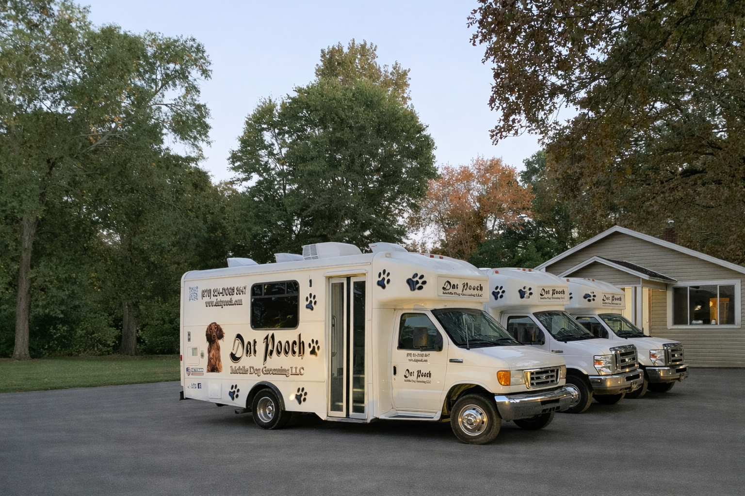 Dat Pooch mobile grooming vans in driveway